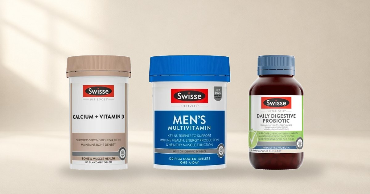 Three Swisse bottles standing on a cream studio floor, one from the Ultiboost, Ultivite and Ultibiotic ranges, with the range name printed under the brand mark on each